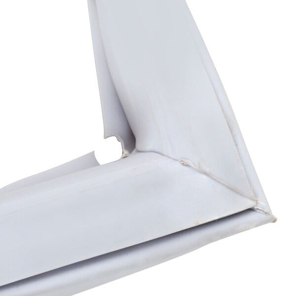 A white vinyl magnetic door gasket with a white plastic frame.