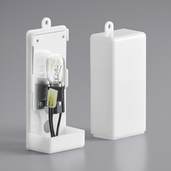 A white rectangular light cover for Main Street Equipment refrigerators.