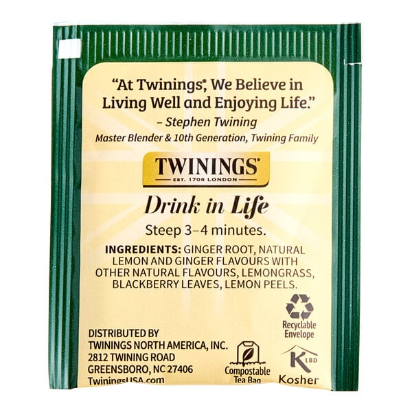 A green Twinings package of Lemon & Ginger tea bags with white and black text.