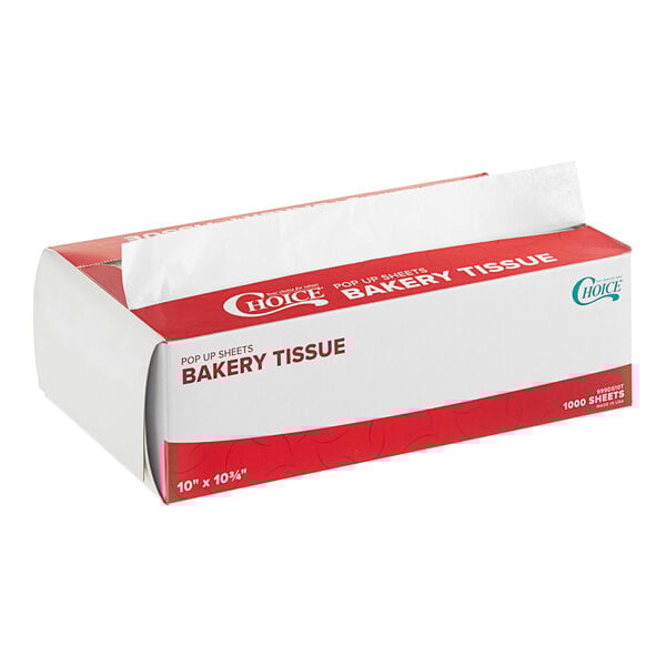 A red and white Choice box of 1000 interfolded bakery tissue sheets on a counter.