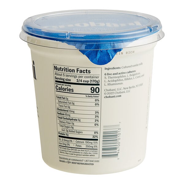 A Chobani Non-Fat Plain Greek Yogurt container with a blue lid.