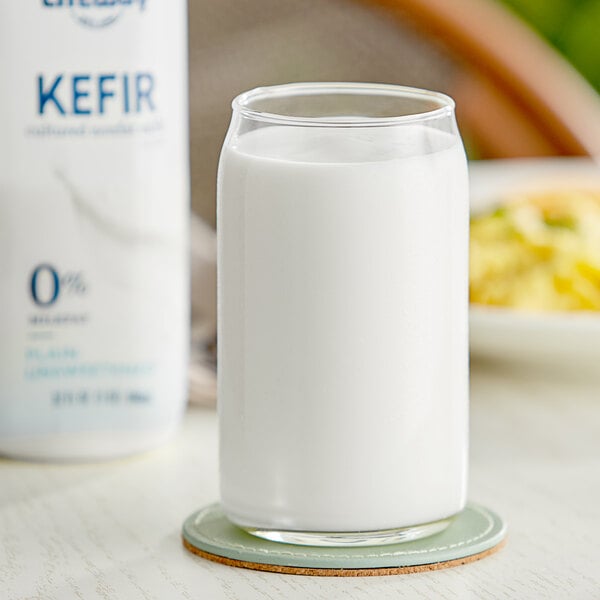 A glass of Lifeway Non-Fat Plain Kefir on a coaster.