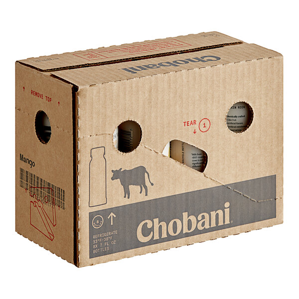 A cardboard box with holes in the middle containing 8 Chobani Low-Fat Mango Greek Yogurt drinks.