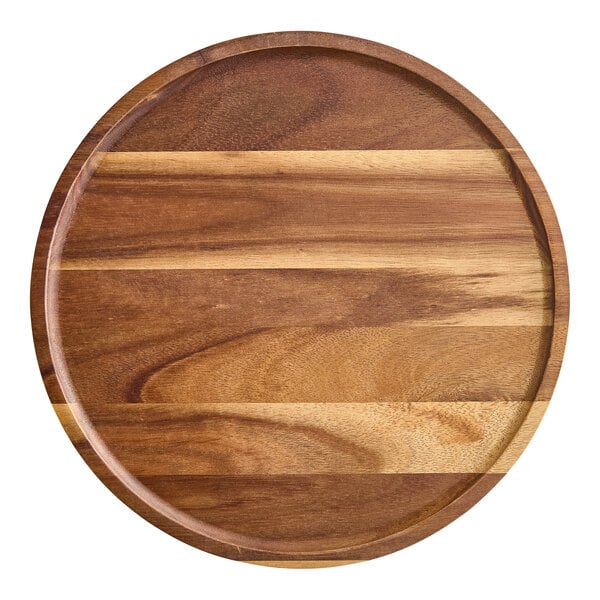 An American Metalcraft round acacia wood serving board.