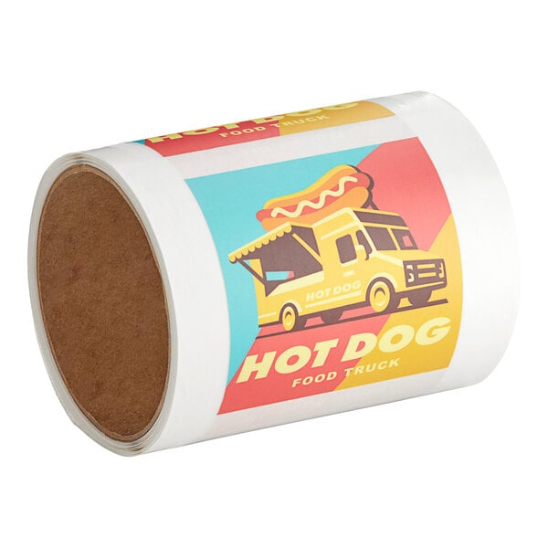A roll of Carnival King custom square vinyl labels with a yellow food truck on it.