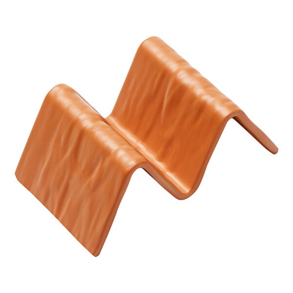 An American Metalcraft orange faux slate melamine taco holder with curved edges.