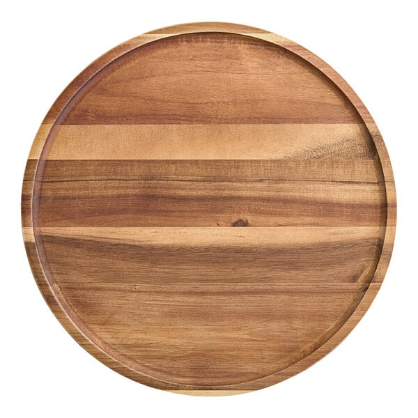 An American Metalcraft round acacia wood serving board with a circular edge.