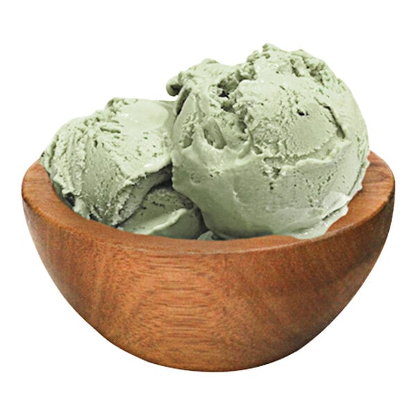A bowl of G.S. Gelato green tea gelato on a table.