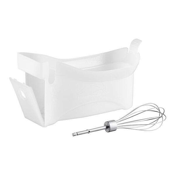A white plastic container with a Hamilton Beach hand mixer, beaters, and whisk inside.
