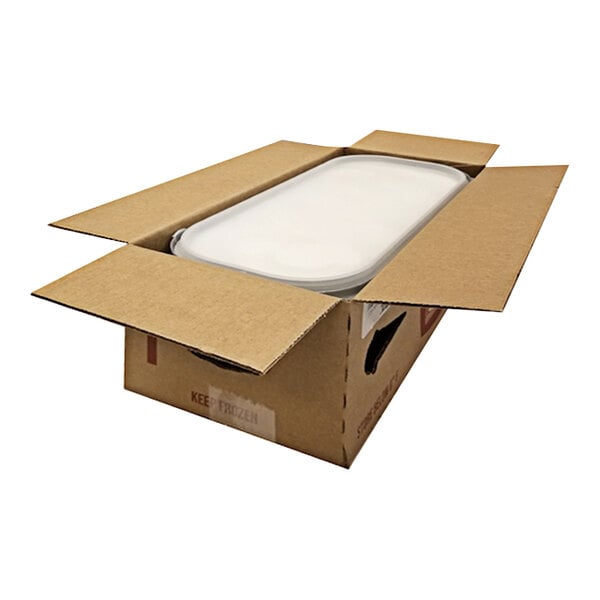 A white G.S. Gelato box with a white lid containing a white oval container of lemon sorbet.