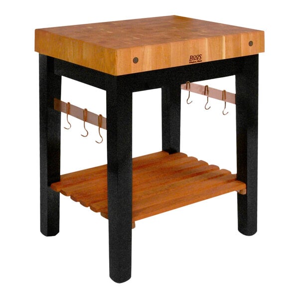 A John Boos cherry wood prep block with an undershelf and pot hooks.