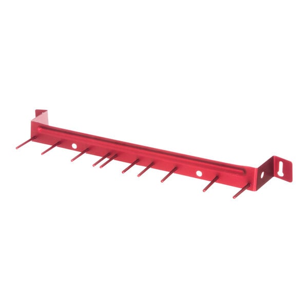 A red metal Carlisle brush rack with holes.