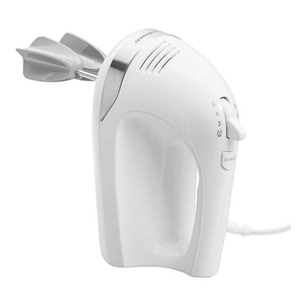 A white Hamilton Beach electric hand mixer with a cord.