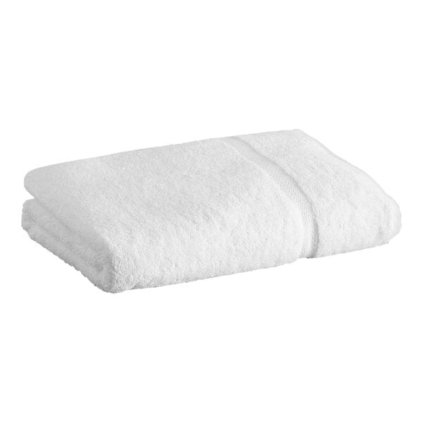 A rolled white Lavex Premium bath sheet.