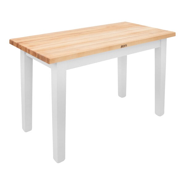 A white table with a wooden top from John Boos & Co. 