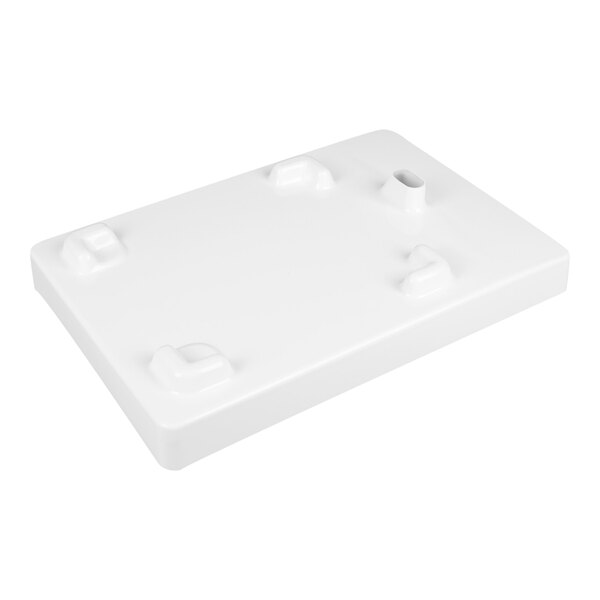 A rectangular white tray with raised sections and a small cylindrical opening on one side.