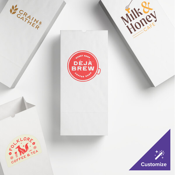 A set of customizable white paper bags featuring various printed café and shop logos.