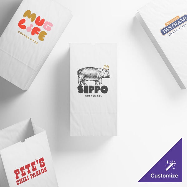 A set of customizable white paper bags with various printed business logos and designs.