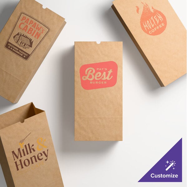 A set of natural kraft paper bags with customizable printed designs.