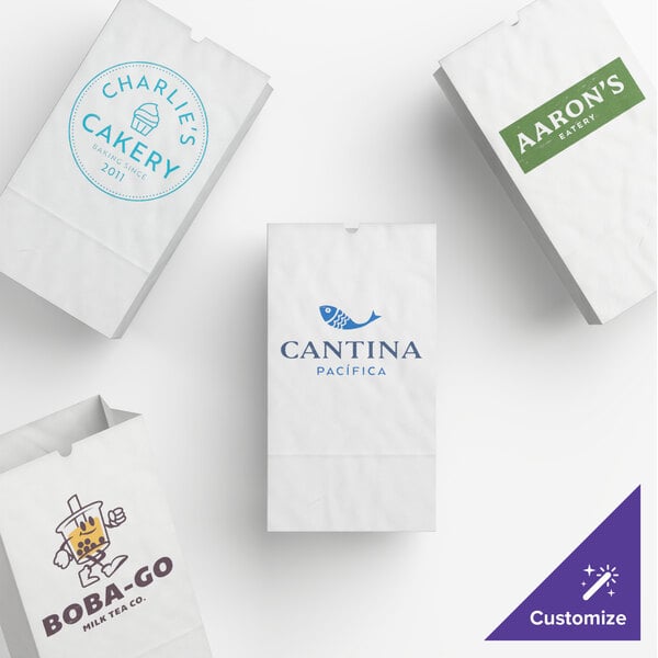 A set of white paper bags featuring various custom printed business logos.