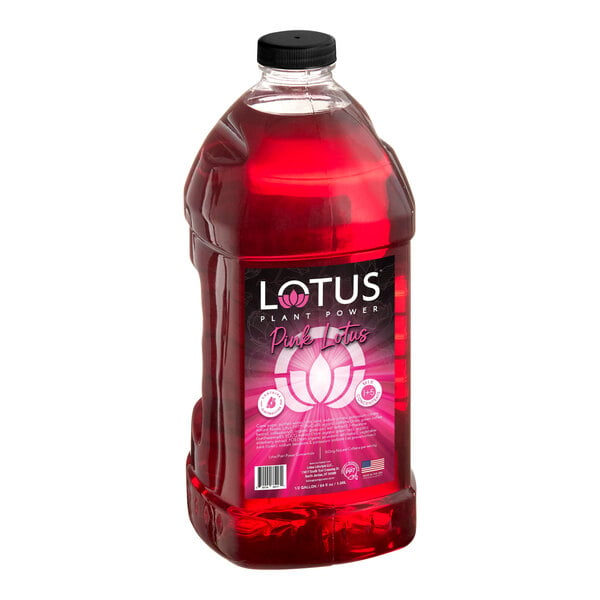 A large clear plastic bottle filled with bright pink liquid and labeled 'Lotus Plant Power Pink Lotus 5:1 Energy Concentrate 64 fl. oz.'