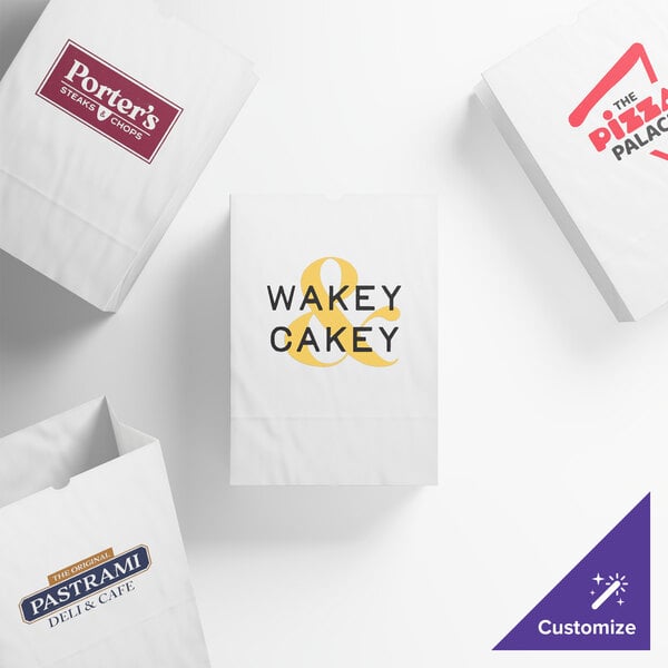 A selection of customizable white heavy-duty paper barrel sacks with various printed business logos and designs.