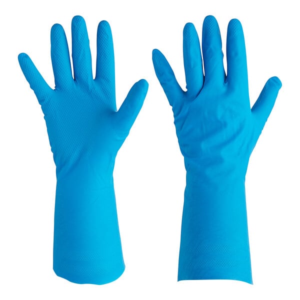 A hand wearing a blue Ansell AlphaTec nitrile glove with a lozenge grip.