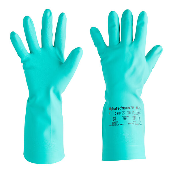 A hand wearing a green Ansell AlphaTec Solvex rubber glove with sandpatch on the palm.