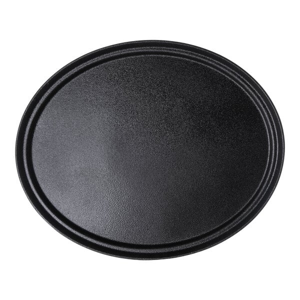 A black oval Carlisle Griptite non-skid fiberglass serving tray.