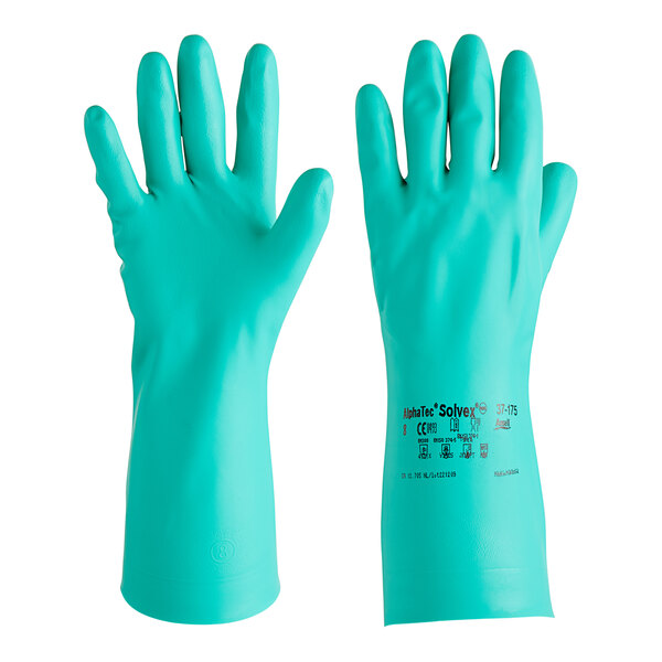 A close-up of a pair of green Ansell AlphaTec Solvex nitrile gloves with a cotton flock lining.