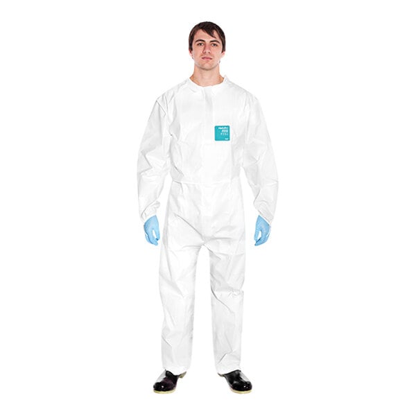 A person wearing a white Ansell AlphaTec protective suit.