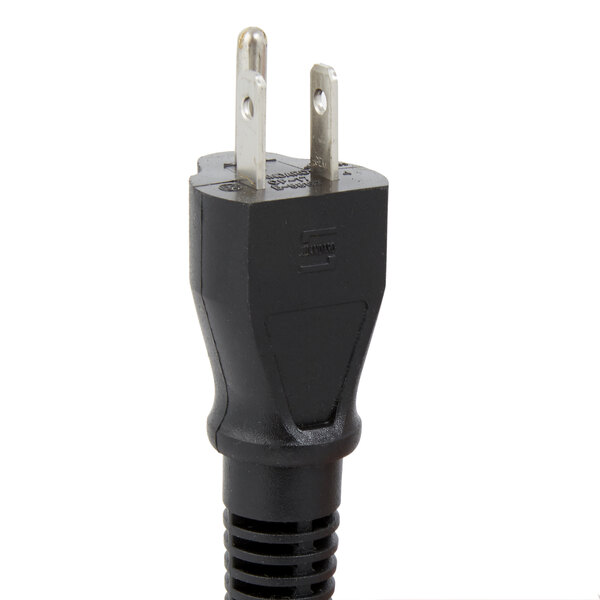 A black electrical plug on an APW Wyott round warmer.