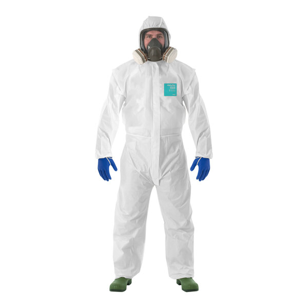 A person wearing a white Ansell AlphaTec protective coverall.