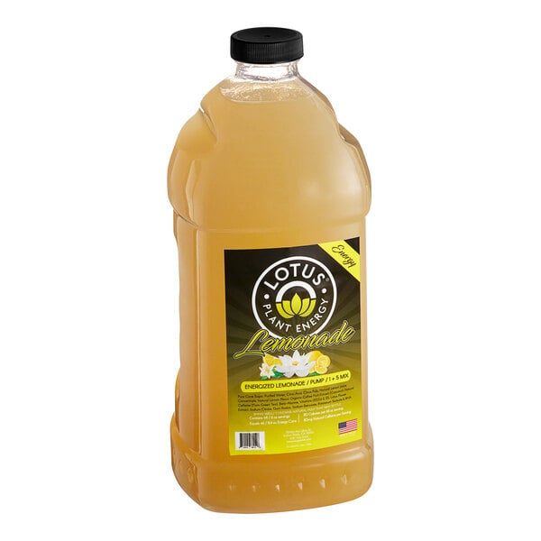 A plastic bottle of Lotus Plant Energy Lemonade concentrate with yellow liquid.