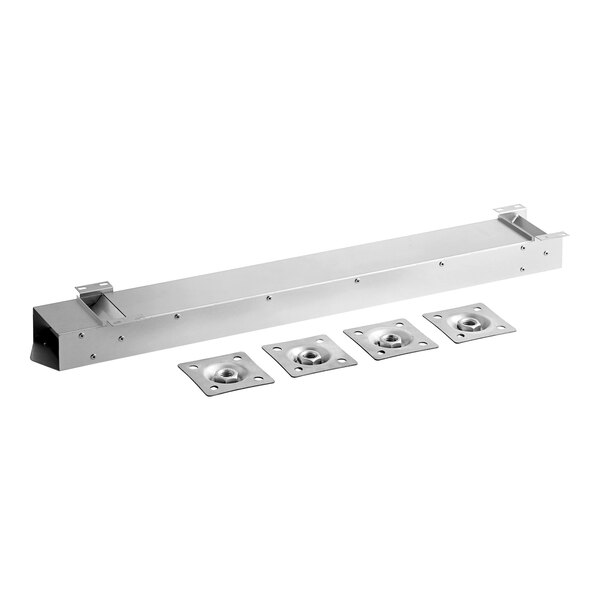 A stainless steel shelf with four square holes.