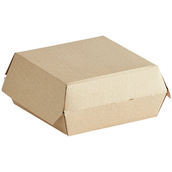 A close-up of a Sabert corrugated cardboard take-out box with a lid.