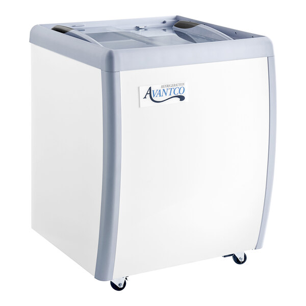 An Avantco gelato dipping cabinet with pans inside.