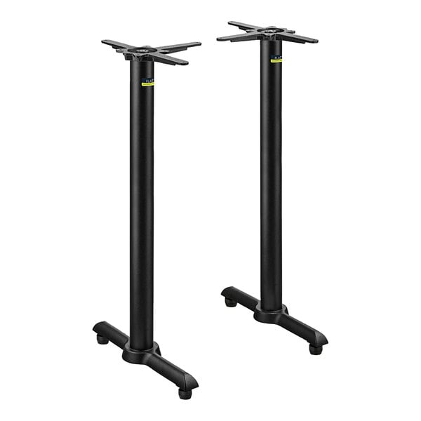 A pair of black metal FLAT Tech bar height table bases.