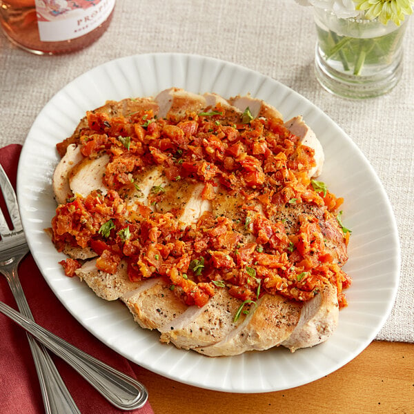 A plate of food with Sevillo Fine Foods Slow Roasted Diced Tomato Bruschetta.