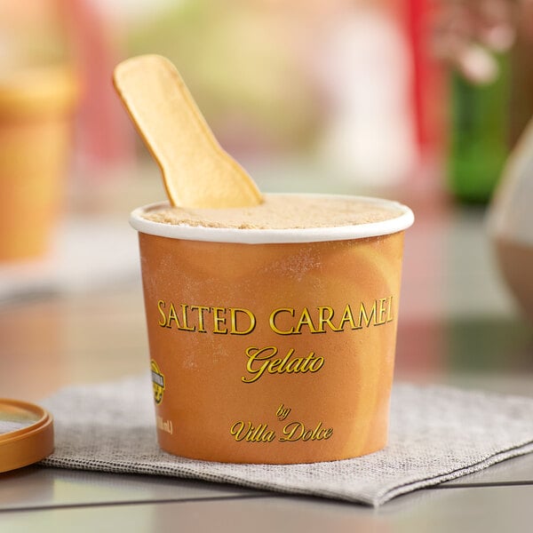 A Villa Dolce Sea Salt Caramel Gelato cup with a spoon.