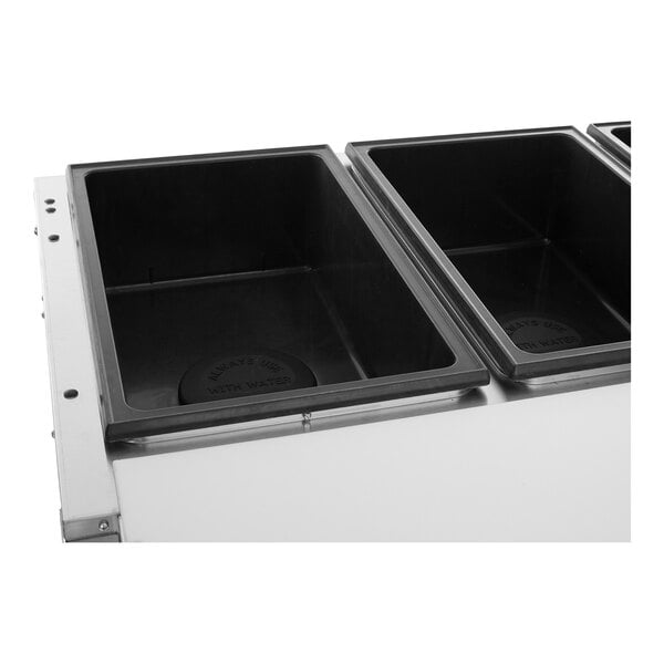 A stainless steel electric three pan hot food table with sealed wells.