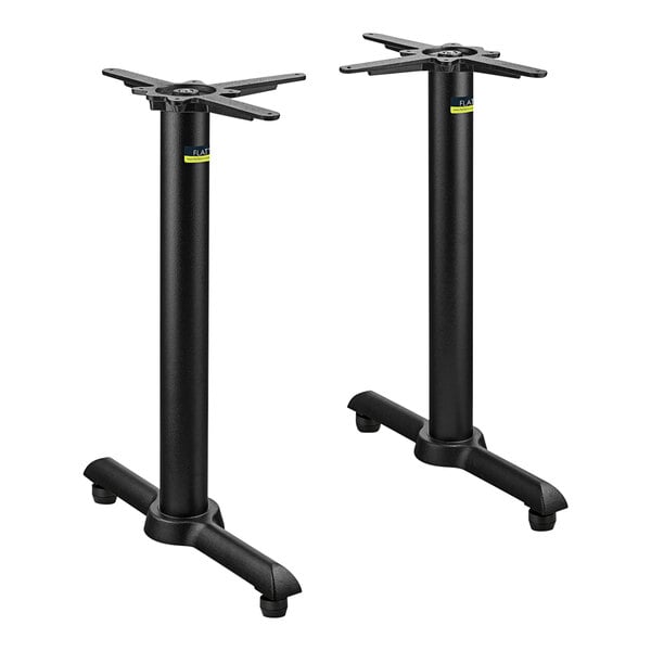 A pair of FLAT Tech black metal table legs.
