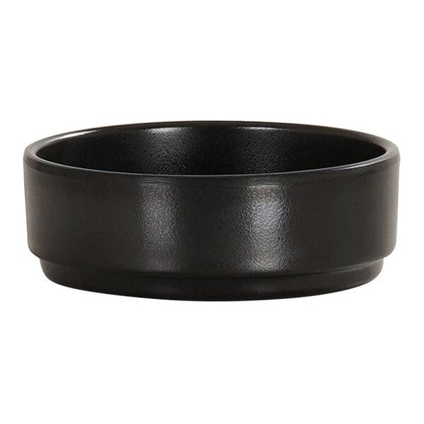 A small black straight-sided melamine ramekin.
