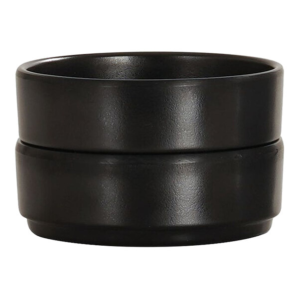 A black, straight-sided melamine ramekin with a 2 oz. capacity.