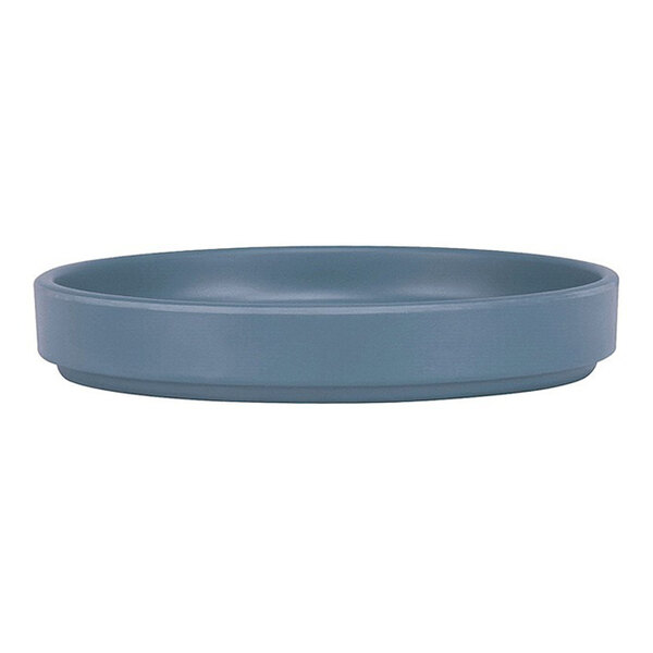 A Cal-Mil Hudson blue melamine plate with a raised rim.