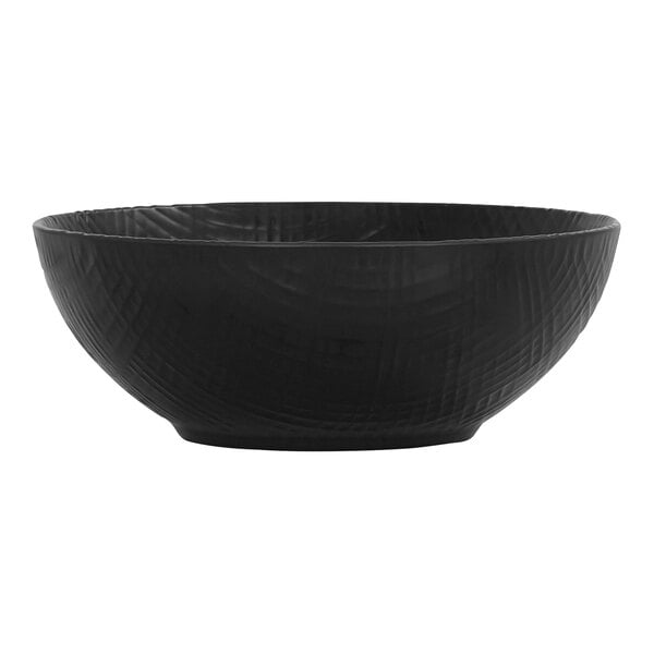 A black Cal-Mil melamine bowl with a textured pattern.