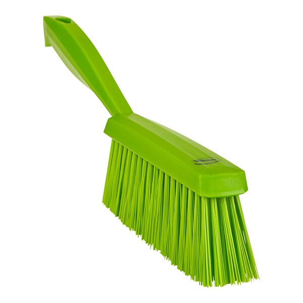 A lime green Vikan hand brush.