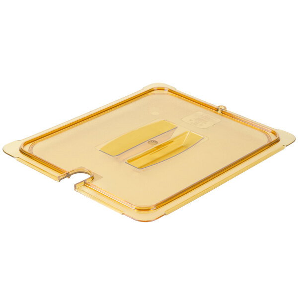 A yellow plastic Carlisle lid with a handle and a hole in the middle.