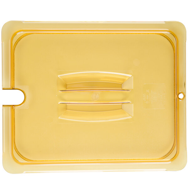 A yellow plastic lid with a handle and white text.