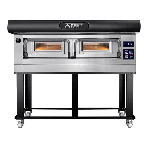 A black and silver Moretti Forni electric pizza deck oven with a black stand.